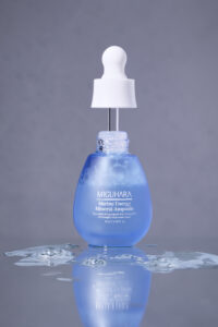 Miguhara Marine Energy Mineral Ampoule, 35mL, in a sophisticated glass bottle with a dropper for easy application. Infused with marine-derived minerals, this ampoule hydrates, nourishes, and revitalizes the skin, perfect for enhancing a radiant and healthy complexion.