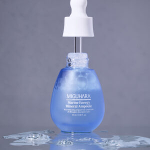 Miguhara Marine Energy Mineral Ampoule, 35mL, in a sophisticated glass bottle with a dropper for easy application. Infused with marine-derived minerals, this ampoule hydrates, nourishes, and revitalizes the skin, perfect for enhancing a radiant and healthy complexion.