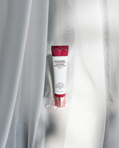 A sleek, metallic silver tube of Miguhara Anti-Wrinkle Effect Eye Cream Origin, 30mL, featuring a precision applicator tip for targeted use. Designed to reduce the appearance of fine lines and wrinkles, this cream offers a luxurious solution for youthful, refreshed eyes.