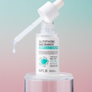A bottle of Glutathione Niacinamide Ampoule Serum 40mLwith a dropper on top with one droplet