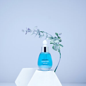 Miguhara Aqua Balance Ampoule, 35mL, in a sophisticated glass bottle with a dropper for precise application. The design highlights its hydrating and balancing formula, ideal for achieving refreshed and radiant skin. Perfect for enhancing any skincare routine.