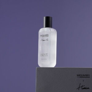 A sleek, pastel green bottle of Miguhara Vegan Skin Relief Soothing Essener, 100mL, designed for sensitive skin. The bottle features a clean, modern design with white labeling, highlighting its vegan and soothing properties. Ideal for calming and hydrating irritated skin