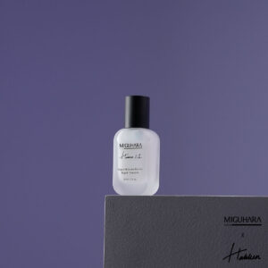 A compact, frosted glass bottle of Miguhara Vegan Moisture Barrier Ampoule, 30mL, featuring a minimalist design with a dropper cap. The ampoule is formulated to strengthen the skin's moisture barrier, providing deep hydration and nourishment for a healthy, radiant complexion.