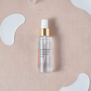Dermarssance Highprime Collagen Ampoule Mist bottle flat lay with collagen patched around