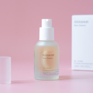 Bottle of Mixsoon - Bean essence 30ml on the pink background