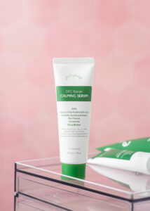 Elleybear DPG Barrier Calming Serum standing on top of clear container